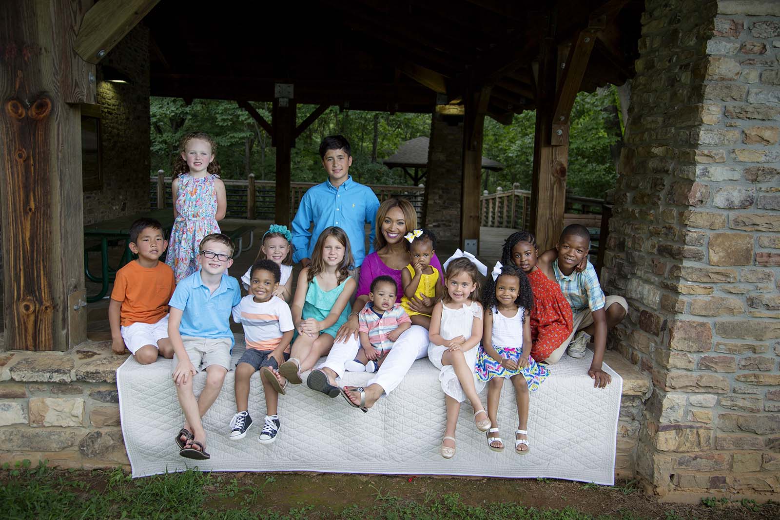 Premier Pediatric Associates doctors with children outside