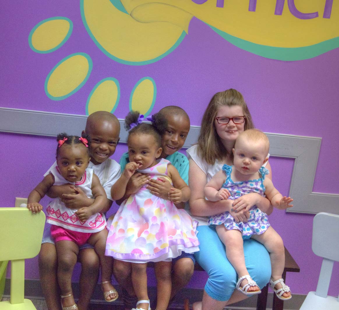 Premier Pediatric Associates doctors with young patients